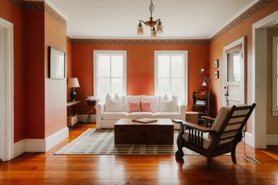Deze warme aardetinten verdringen grijs in je woonkamer